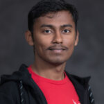 A headshot of Abhinav in front of a plain background.